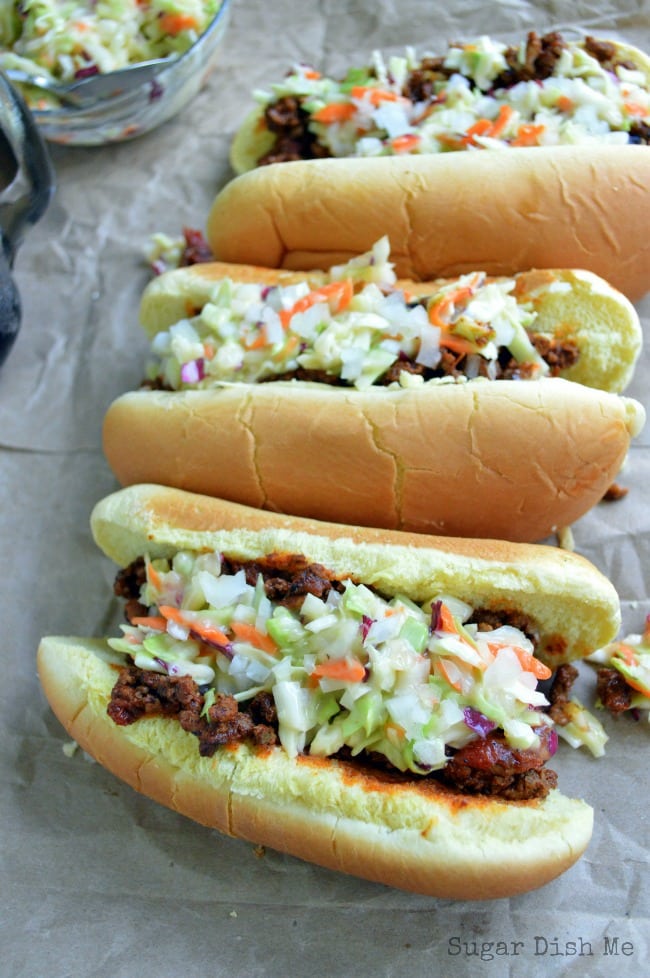 A Carolina tradition! Carolina Style Hot Dogs are covered in a beefy chili, creamy homemade cole slaw, and onions. Ketchup and mustard are optional. Serve these at your next backyard BBQ for a crowd-pleasing win!