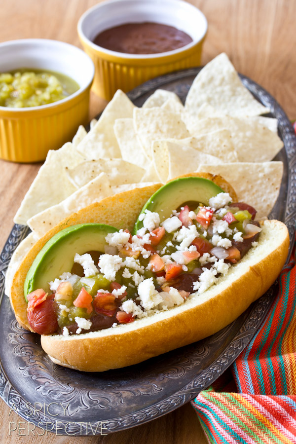 Green Chile Mole Hot Dog Recipe will make you say OLE! Plus a quick and easy mole recipe that gives these Mexican style hot dogs serious wow-factor.