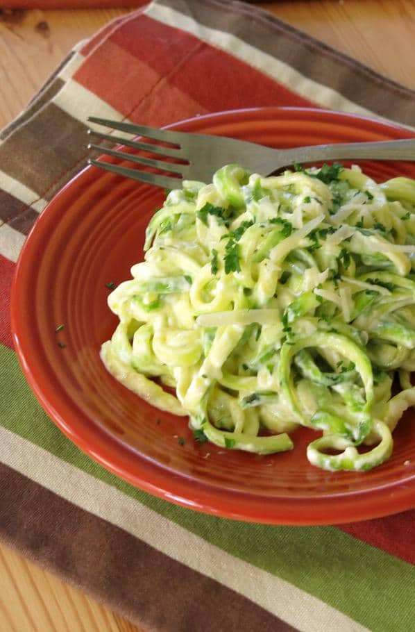 Zucchini Noodle Alfredo is the answer to cravings for a decadent pasta dish. It's creamy, cheesy, low-carb, and takes just minutes to prepare!