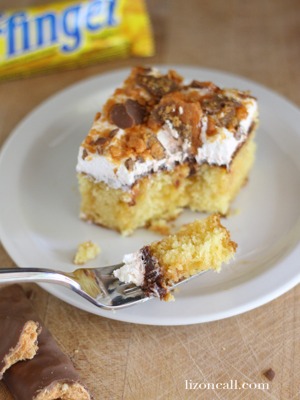 Butterfinger Cake uses a boxed cake mix made according to the directions,  with butterscotch, chocolate pudding, whipped topping and crushed up butterfinger candy bars. 