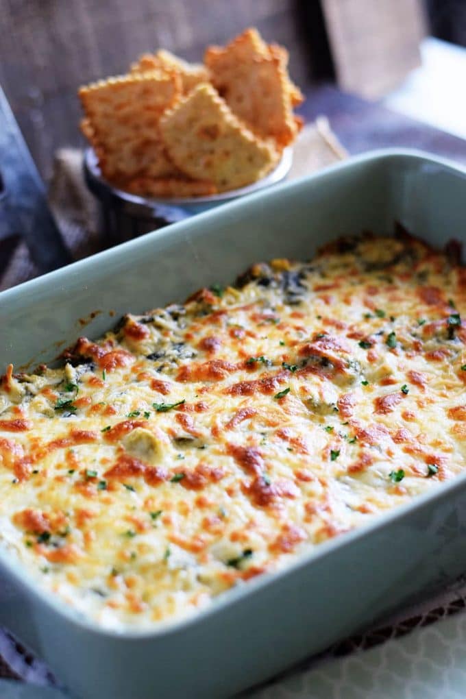 Oh so good and absolutely effortless, this Slow Cooker Spinach and Artichoke Dip is the perfect appetizer for any occasion.