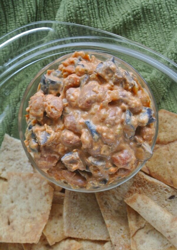 Slow Cooker Creamy Chili Dip is cooked in a crock pot and is done in a few short hours. Spicy good with fresh veggies and chips makes this a 5 star recipe.