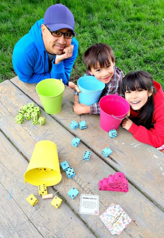 What’s a crafty girl to do when she’s afraid that she’s going to lose small dice from her favorite game while playing outside? Make a bigger wooden set for outdoor play! 