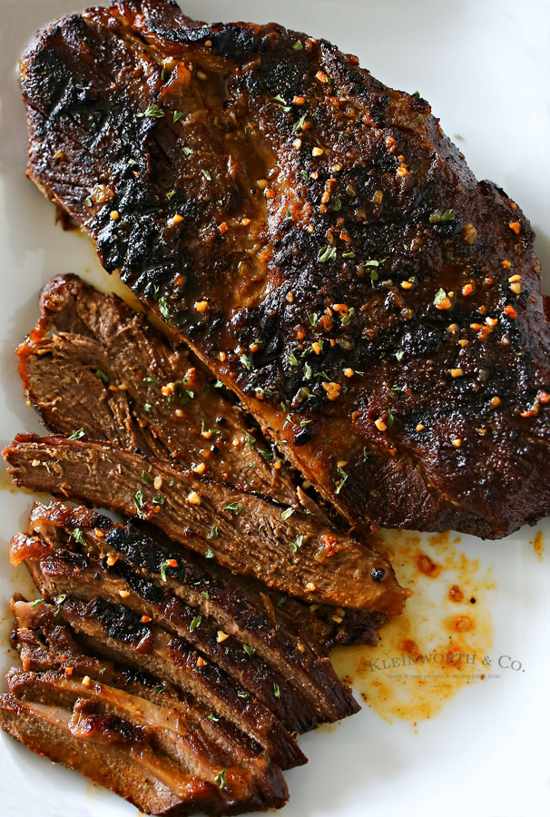 This Easy BBQ Beef Brisket recipe is so delicious & the perfect grilling recipe to enjoy all summer long. Add to a sandwich or enjoy with grilled corn.