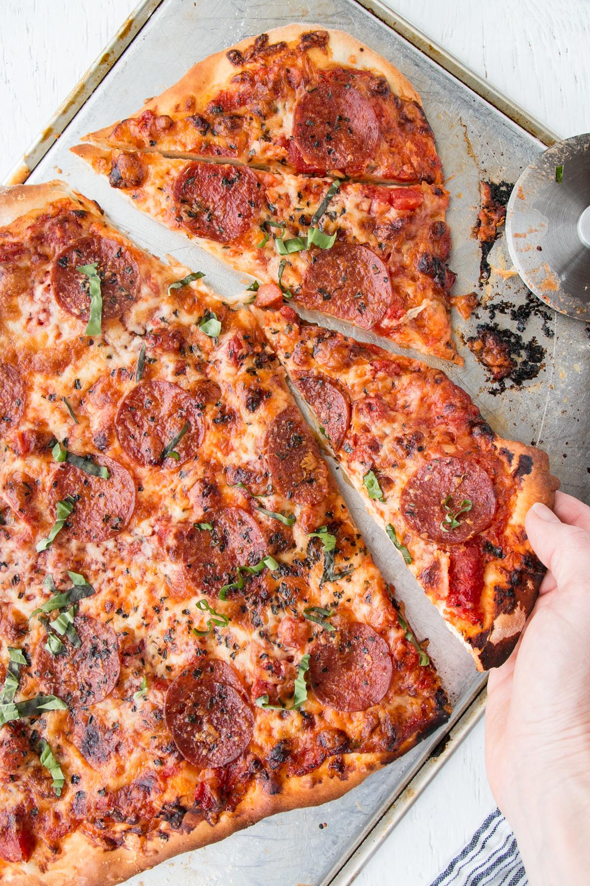 Homemade Pepperoni Pizza | Cooking with Kids, a classic recipe with tips and tricks to help get kids cooking. Getting the kids involved in making a well-loved dish like a Pepperoni Pizza for a family meal.
