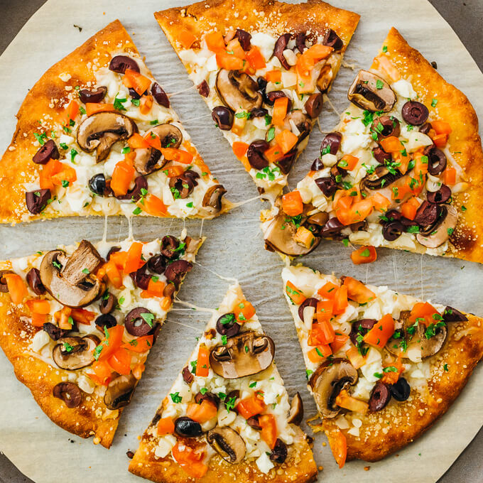 Follow this easy recipe to make a keto pizza crust that’s grain free, using what’s commonly referred to as fathead dough. The pizza is topped with low carb Greek style toppings.