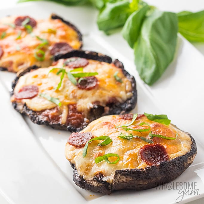 Portobello pizza is an easy and delicious way to make keto stuffed mushrooms! This low carb portobello mushroom pizza recipe is quick with a few ingredients, delicious for the whole family, and Atkins friendly.